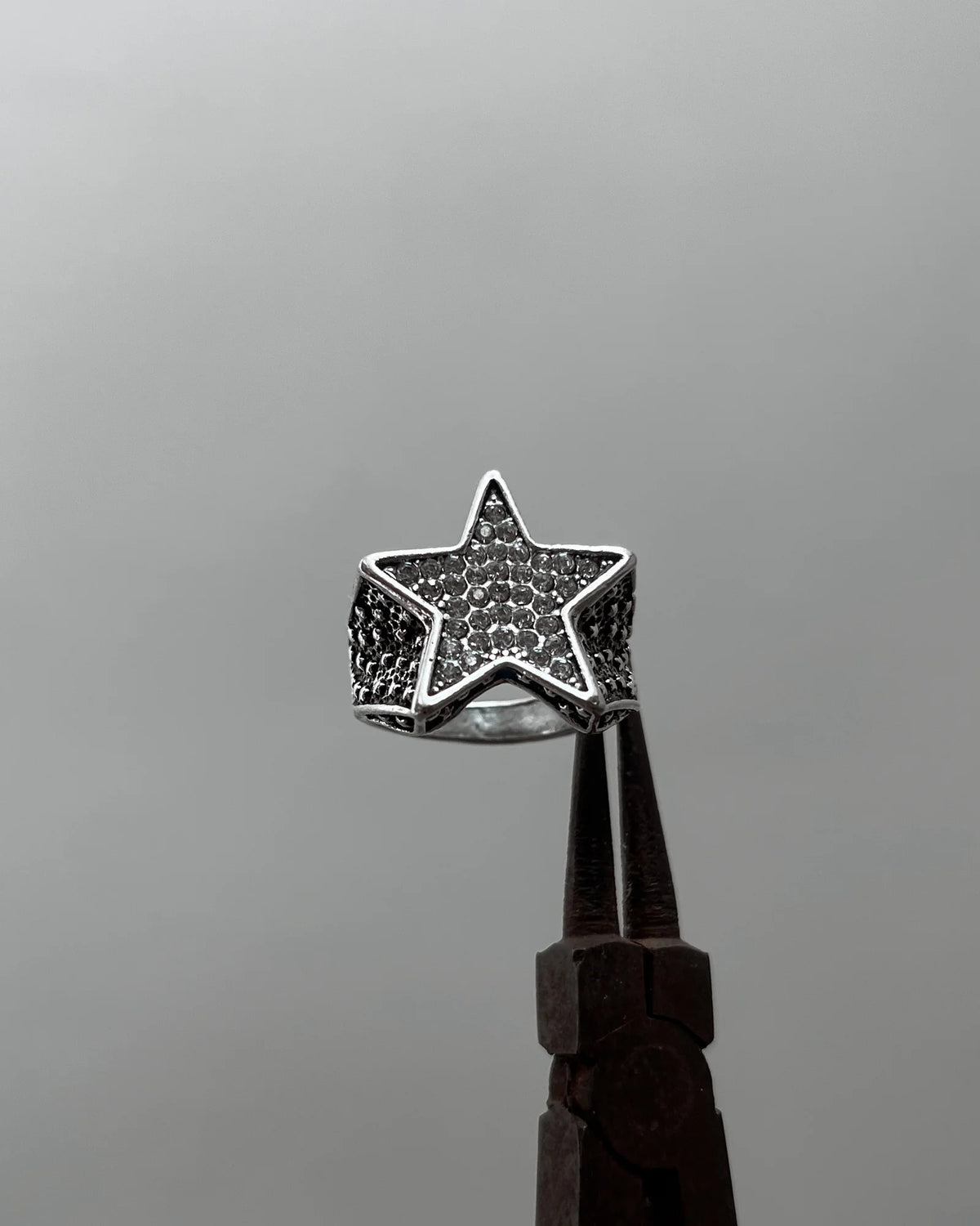 Star iced out ring
